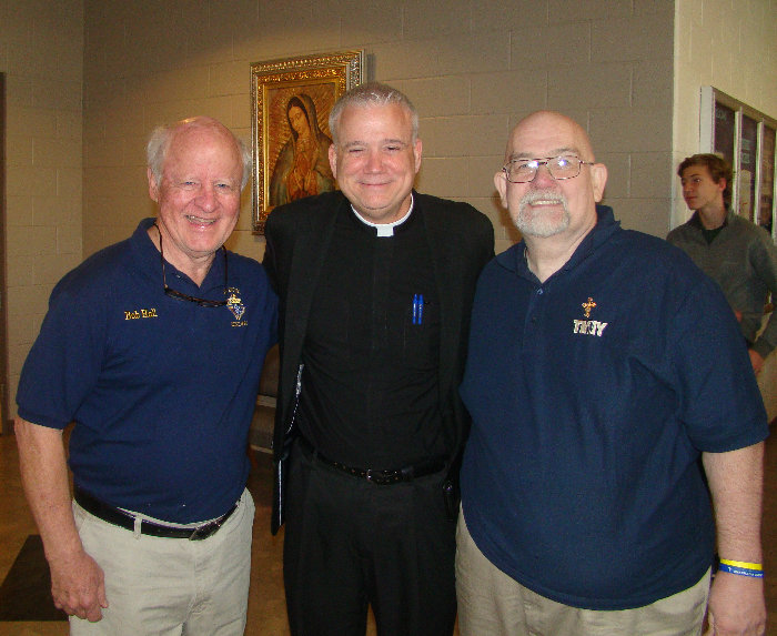 District Deputy Bob Hall, Fr. Larry Richards, Knight Bryan Clark